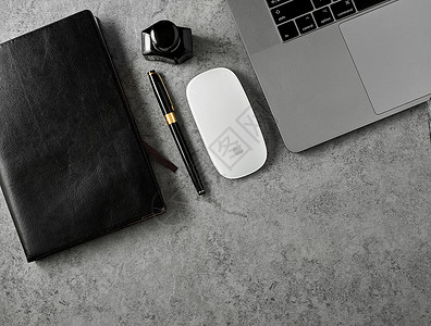 手机黑色办公电脑鼠标钢笔笔记本墨水背景