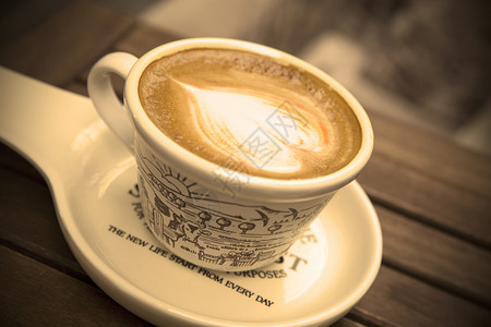 心形咖啡杯咖啡杯里的奶泡背景