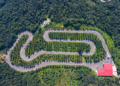 航拍森林道路卡丁车竞速赛道航拍设计图片