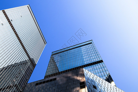 公司蓝色城市写字楼大厦仰视角背景
