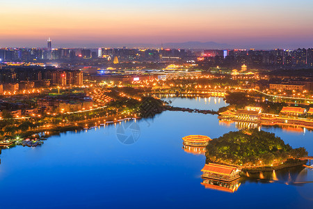 金色夜景曲江池夜色背景