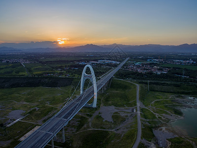 郊区大桥夕阳下的北京密云云蒙大桥背景