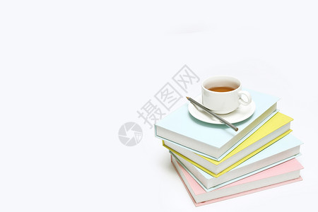 茶笔创意书籍和茶杯摆设背景