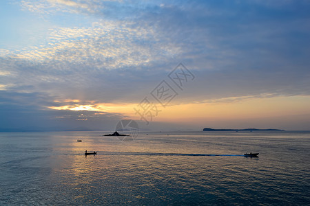 南澳海边夕阳背景图片