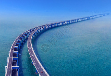 足球海水背景跨海大桥建筑车轨夜景城市建设背景