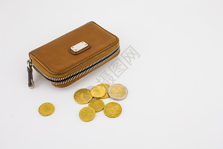 简易零钱包与硬币静物背景图片