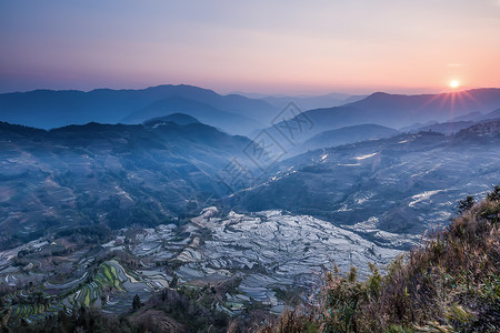 彩色大气背景云南元阳梯田老虎嘴日落背景