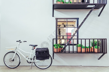 自行车唯美清新房子白墙与自行车背景