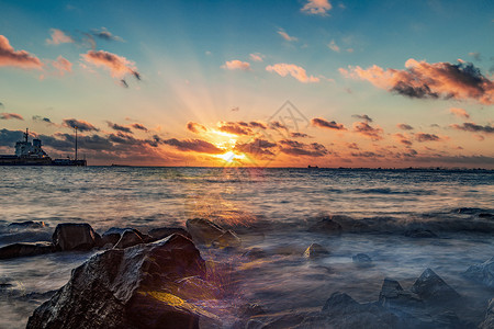 沙滩公园海上日出背景