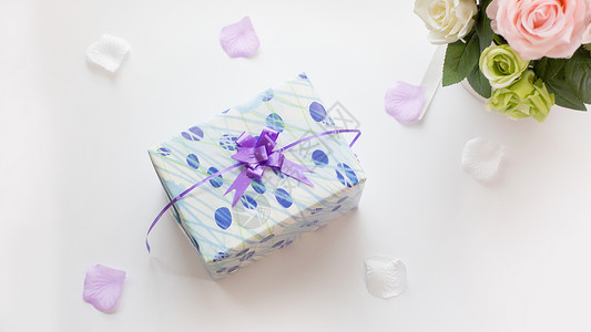 蓝色麻绳蝴蝶结礼物盒节日背景素材背景