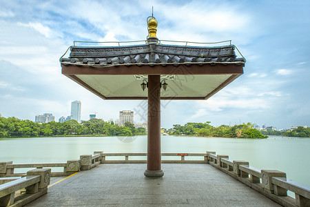 蓝色闪耀光线城市中国风古建筑对称小凉亭背景