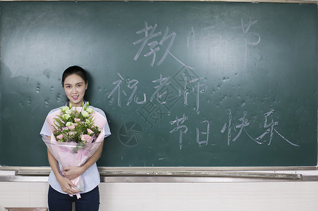 收到鲜花老师教师节女老师收到鲜花背景