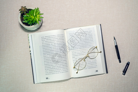 书籍眼镜读书写作钢笔文艺桌面背景