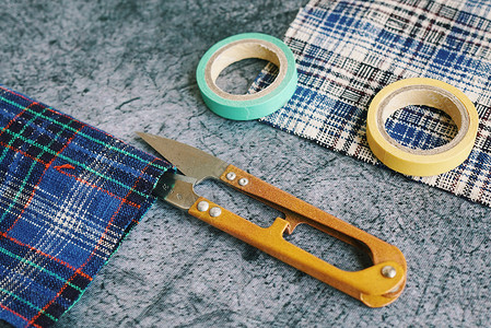 贴膜及素材裁缝的工具及布料背景