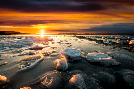 冬季海夕阳下的海冰风景背景