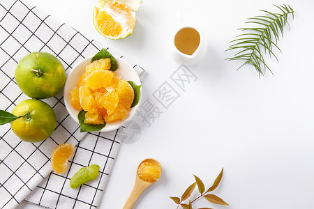 文艺桌面背景白色桌面上的柑橘背景