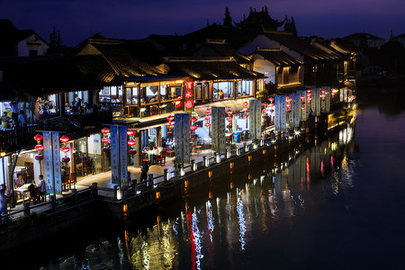 初灯华上旅行江南古镇的夜景背景