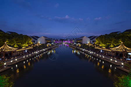 初灯华上旅行江南古镇的夜景背景