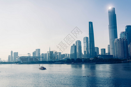 创意周年回归海报夕阳下的珠江新城背景