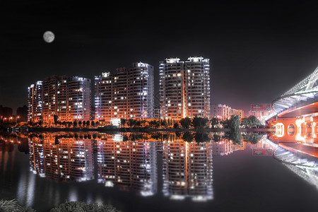 烈士桥梁在月城市月圆夜色背景