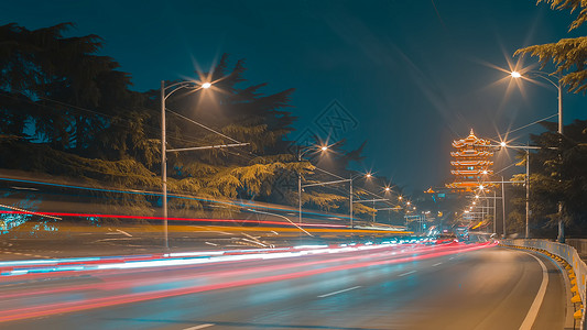 行动轨迹武汉街景车轨夜景背景