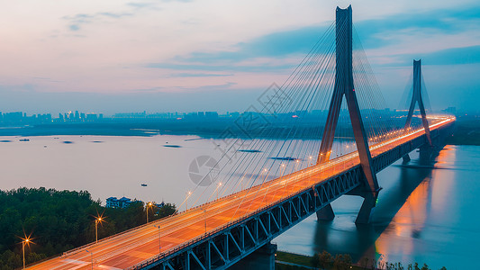 行动轨迹武汉天兴洲大桥夜景背景