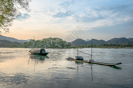 画风景古堰画乡小舟夕阳背景