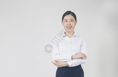 白衬衫领带自信的职场女性背景