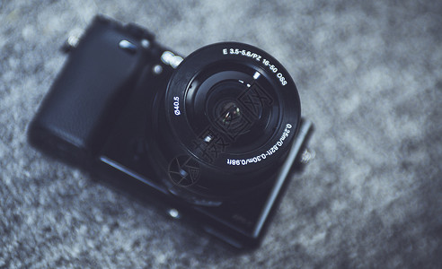 黑色微单相机背景图片
