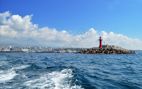 韩国炸酱面韩国济州岛大海灯塔背景