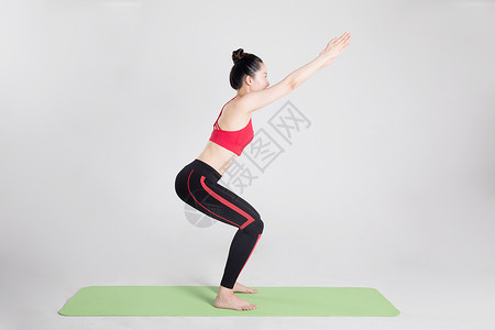 女性健身瑜伽动作棚拍图片