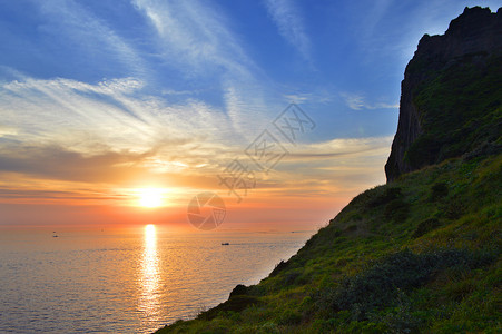 济州国立大学韩国济州岛城山日出峰日出唯美照片背景