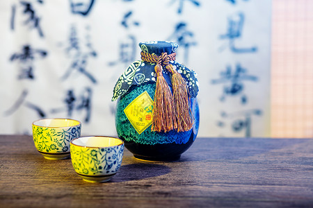 筷子筷箸碟子酒坛和酒杯背景