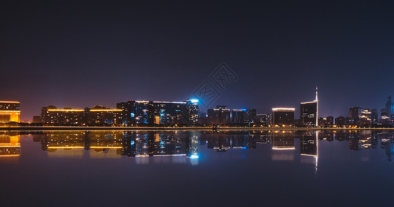 天翼标志城市江边夜景背景