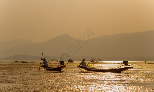 东南亚缅甸湖上渔夫捕鱼表演背景
