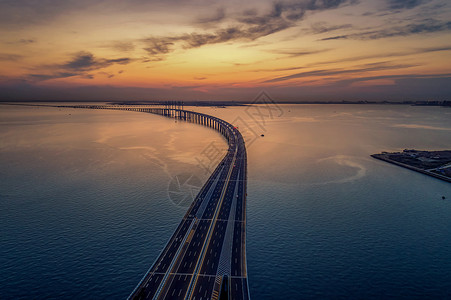 山东高速夕阳下的跨海大桥背景