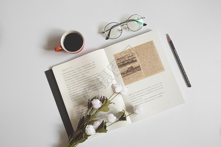 鲜花咖啡素材咖啡和书背景