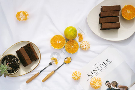 俯拍甜点甜点和橘子创意图片背景