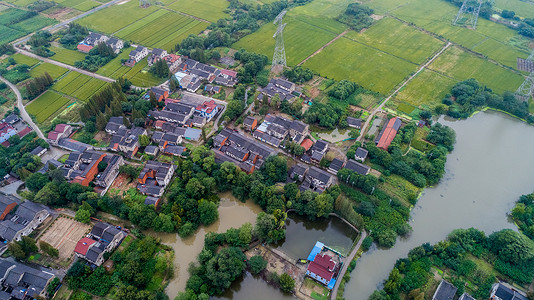 草地别墅航拍农村房屋背景