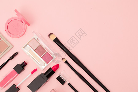 粉色美妆粉色底图上的化妆品背景
