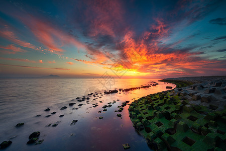 唯美的日出日落风景火烧云下的海景风光背景