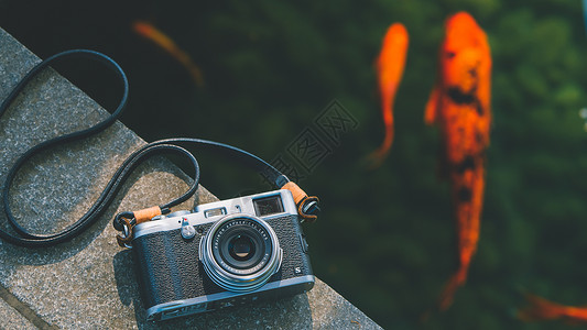 ai胶片素材复古相机与锦鲤背景