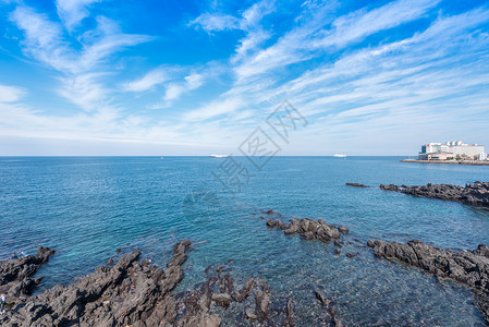 韩国济州岛龙头岩海滨蓝天高清图片素材