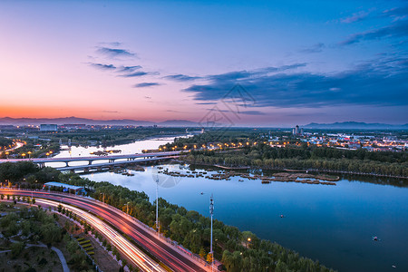 郊区夜景郊区城市下的夕阳背景