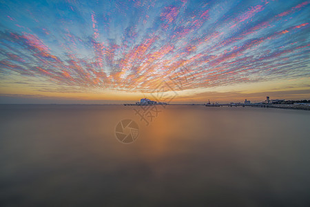 邮轮港海上日出背景