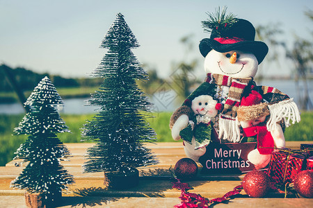 树木和雪人娃娃圣诞节日背景背景