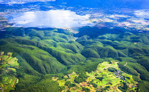 丽江坝子航拍山地湖泊背景