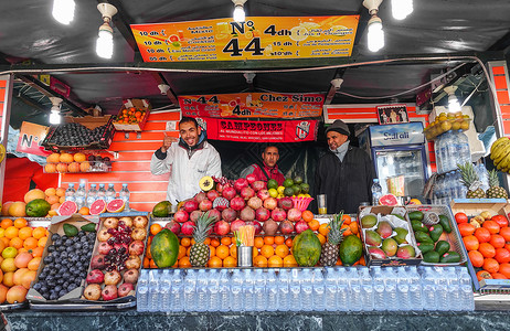 广场上的人马拉喀什德吉玛广场水果摊上的男人背景