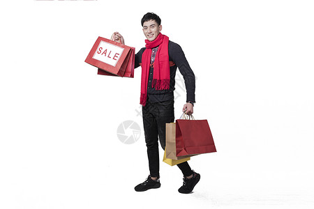 新年喜庆男士人像手持打折购物袋背景图片