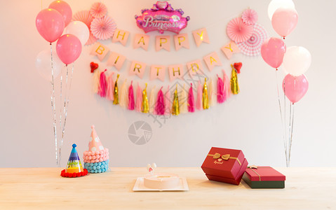生日聚会礼物和蛋糕背景